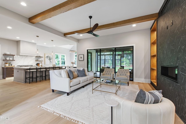 5812 Shawood Dr, Raleigh, NC 27609 - living area featuring recessed lighting, light wood-style flooring, a ceiling fan, and beam ceiling