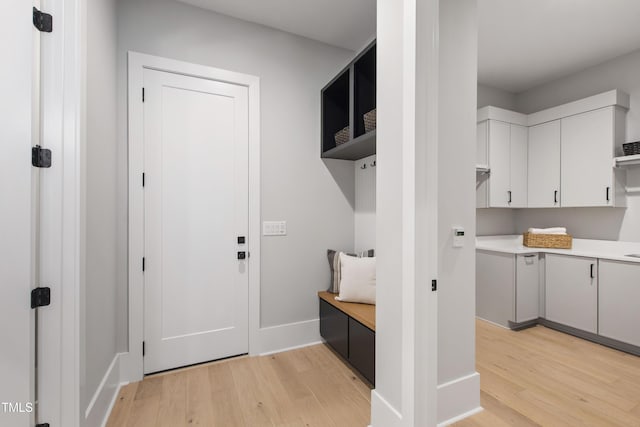 5812 Shawood Dr, Raleigh, NC 27609 - mudroom featuring light wood-type flooring and baseboards