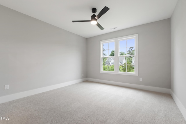 5812 Shawood Dr, Raleigh, NC 27609 - unfurnished room with ceiling fan, light carpet, and baseboards