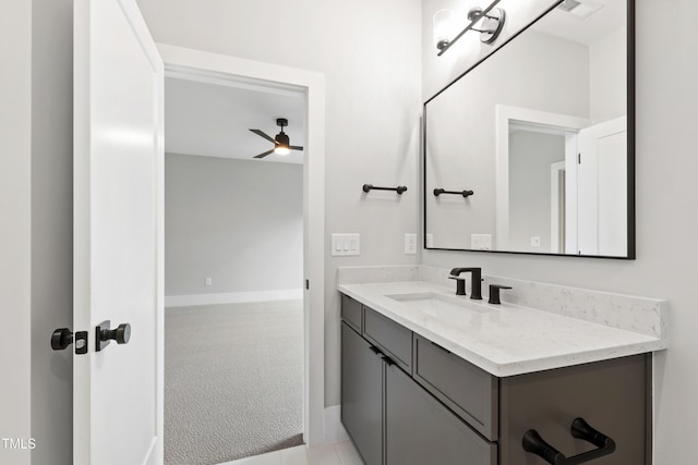 5812 Shawood Dr, Raleigh, NC 27609 - bathroom featuring baseboards, ceiling fan, and vanity
