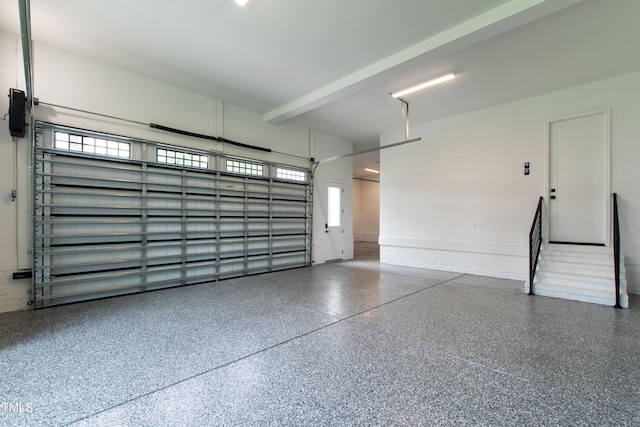 5812 Shawood Dr, Raleigh, NC 27609 - garage featuring baseboards