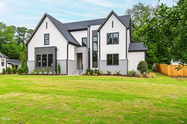5812 Shawood Dr, Raleigh, NC 27609 - modern farmhouse style home with board and batten siding and a shingled roof