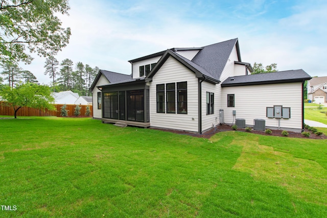 5812 Shawood Dr, Raleigh, NC 27609 - rear view of property featuring a sunroom and central air condition unit