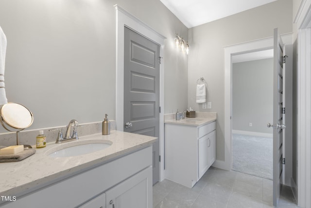210 Colvard Farms Rd, Durham, NC 27713 - bathroom featuring two vanities, tile patterned flooring, and a sink