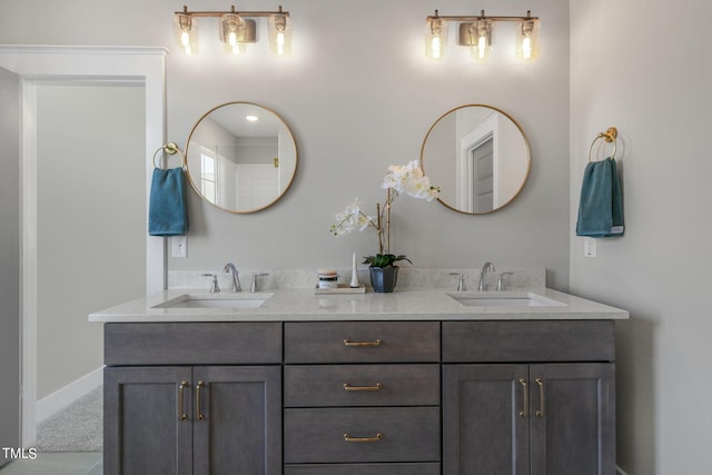 210 Colvard Farms Rd, Durham, NC 27713 - bathroom featuring double vanity, a sink, and baseboards
