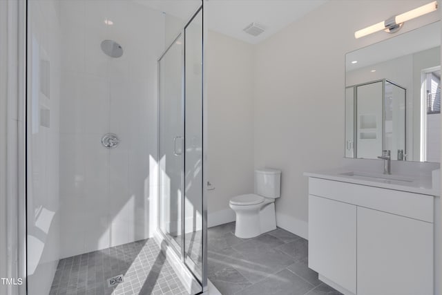 bathroom with vanity, toilet, and walk in shower