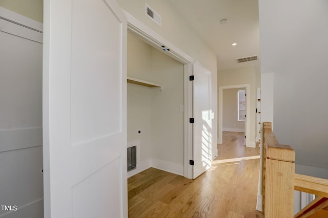 hallway featuring light wood-type flooring