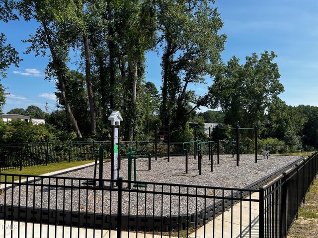 community jungle gym with fence