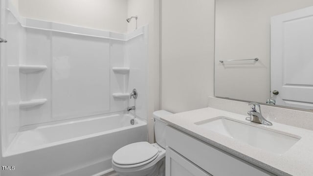 bathroom featuring shower / bath combination, vanity, and toilet