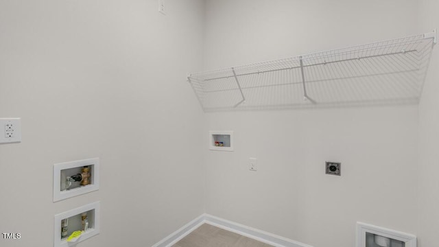 laundry room with laundry area, baseboards, washer hookup, and hookup for an electric dryer