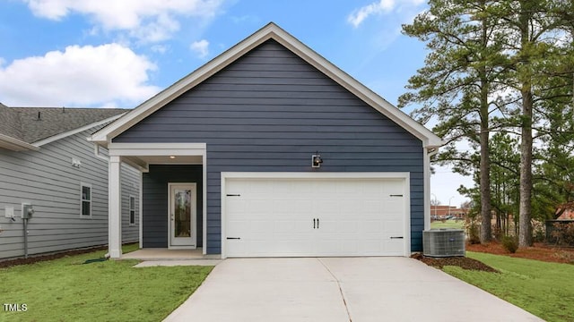 view of front of property with an attached garage, a front lawn, cooling unit, and concrete driveway