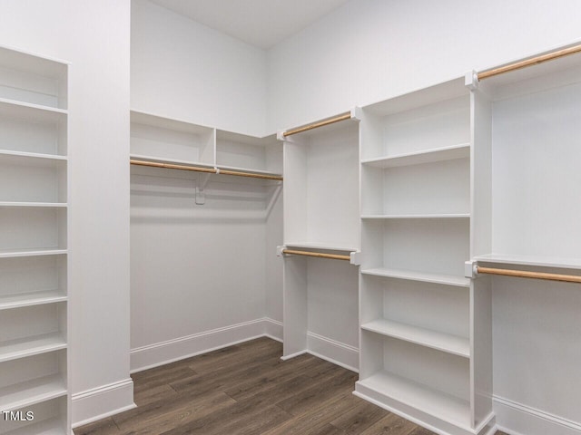 6052 Scalybark Rd, Durham, NC 27712 - walk in closet featuring wood finished floors