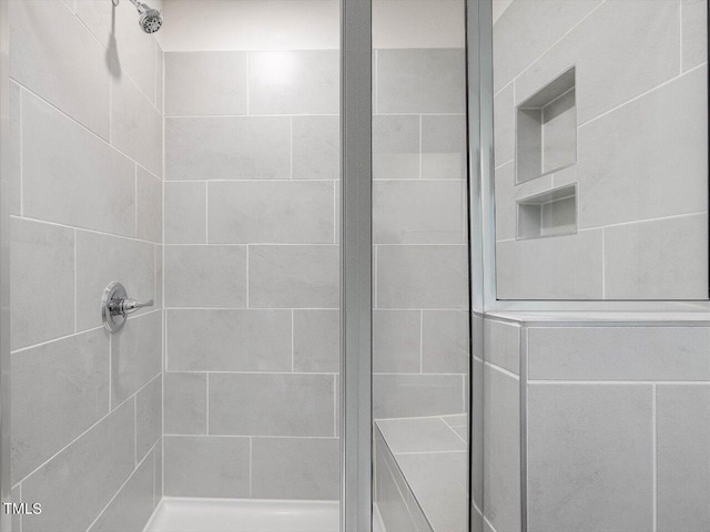 bathroom with a stall shower