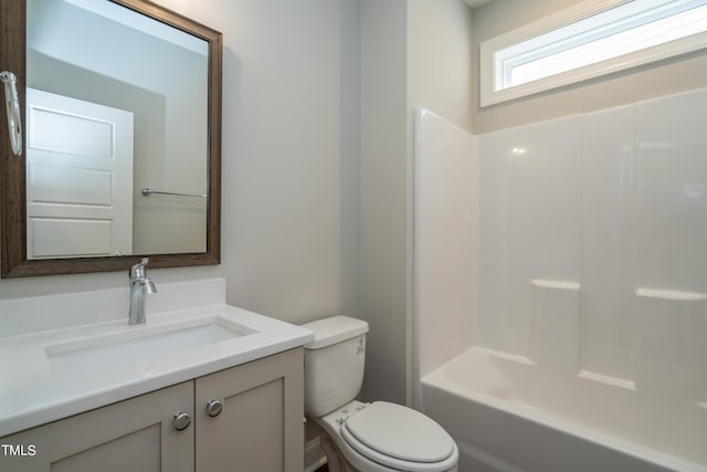 full bathroom featuring vanity, toilet, and bathing tub / shower combination