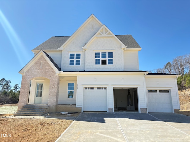 view of front facade with driveway and a garage