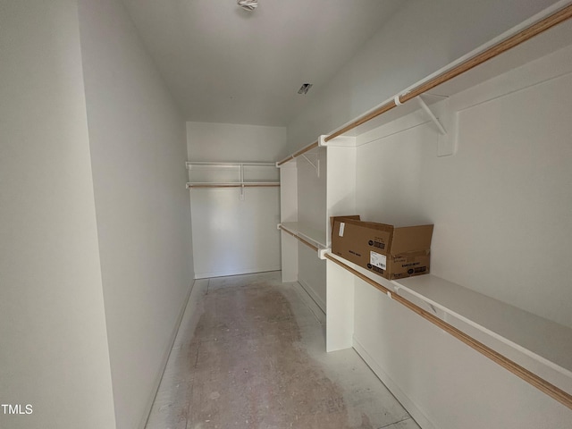 walk in closet with visible vents