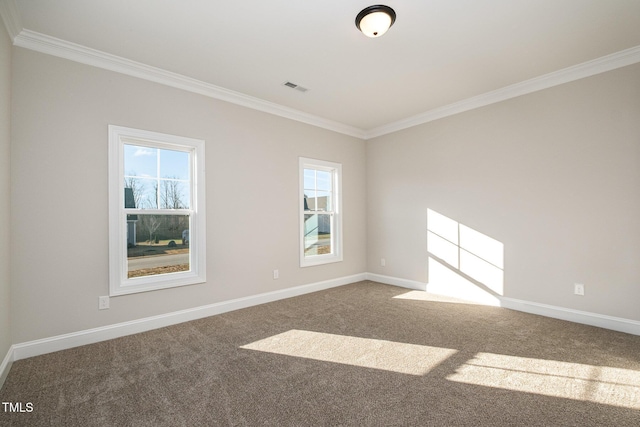 carpeted spare room with ornamental molding