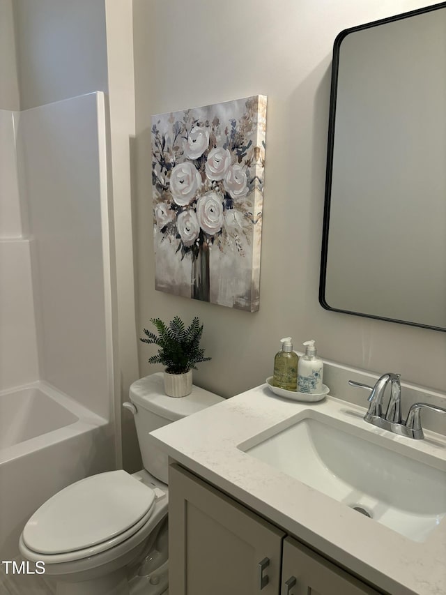 full bathroom featuring vanity, toilet, and bathing tub / shower combination
