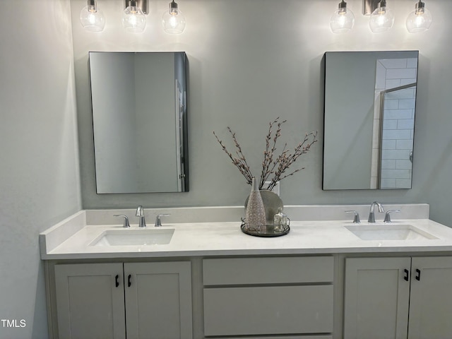 bathroom with vanity and walk in shower