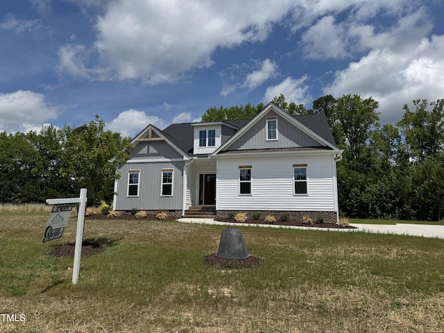35 Uptown Rd, Zebulon, NC 27597 - view of front facade with a front lawn