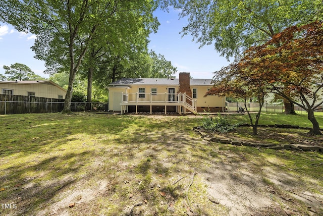 603 E Park St, Cary, NC 27511 - rear view of house featuring a wooden deck, a fenced backyard, a chimney, and stairs