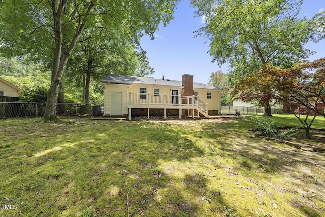 603 E Park St, Cary, NC 27511 - back of house with a wooden deck, a fenced backyard, a chimney, and stairway