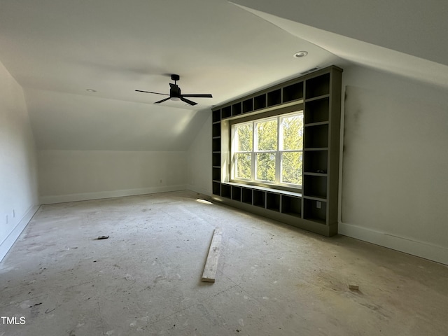 bonus room featuring lofted ceiling and ceiling fan