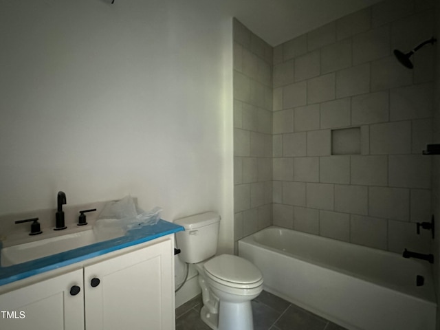 full bathroom with vanity, toilet, tile patterned floors, and tiled shower / bath