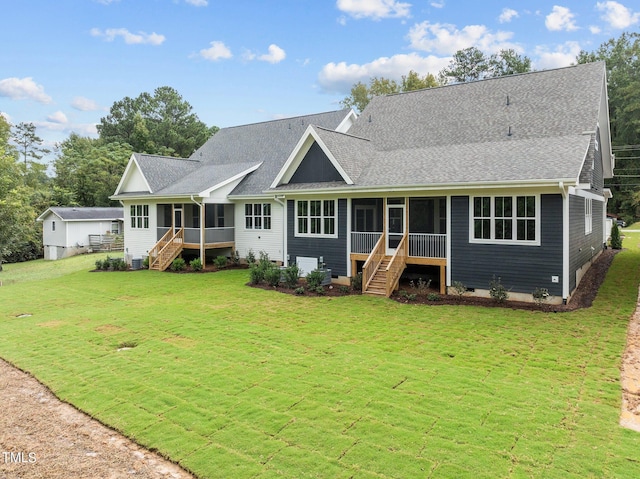 single story home with a sunroom, crawl space, stairway, and a front lawn