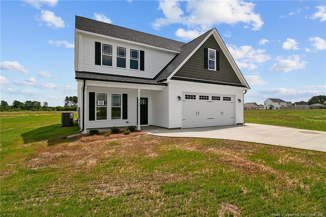 view of front of home with a garage, a shingled roof, concrete driveway, cooling unit, and a front lawn