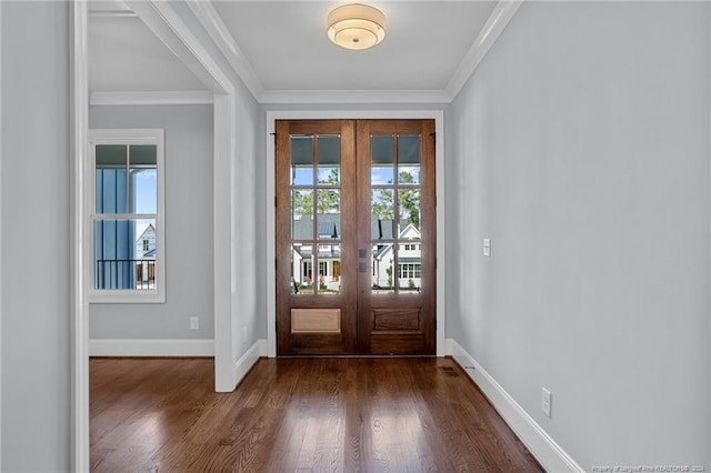 entryway with dark wood-type flooring, crown molding, and french doors