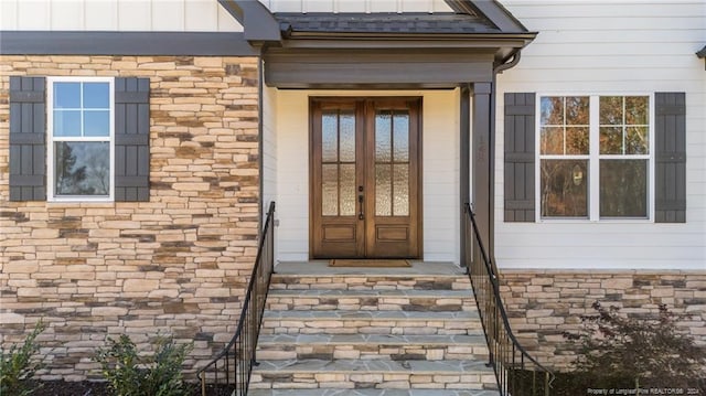 doorway to property with french doors