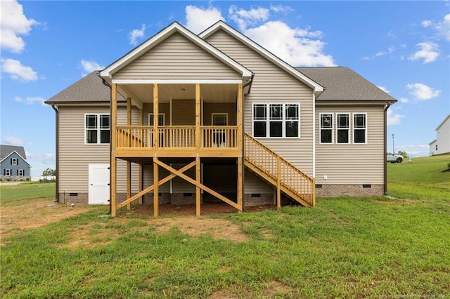 rear view of house with a lawn, stairway, roof with shingles, crawl space, and a wooden deck