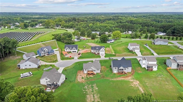 bird's eye view with a residential view and a forest view