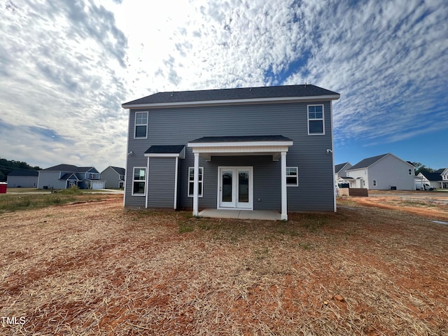 rear view of property with a patio area