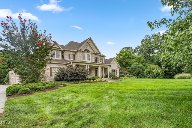 view of front of home featuring a front lawn