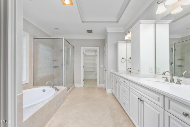 bathroom with vanity, ornamental molding, separate shower and tub, and tile patterned flooring