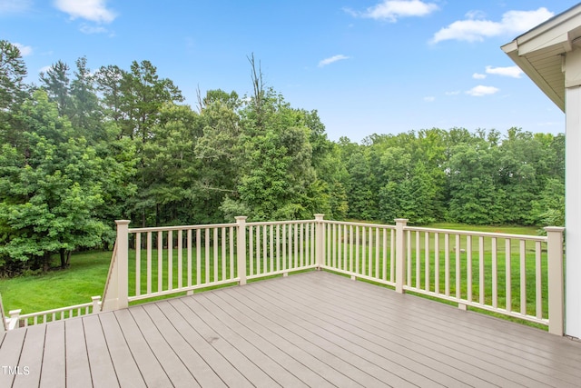 wooden deck with a yard