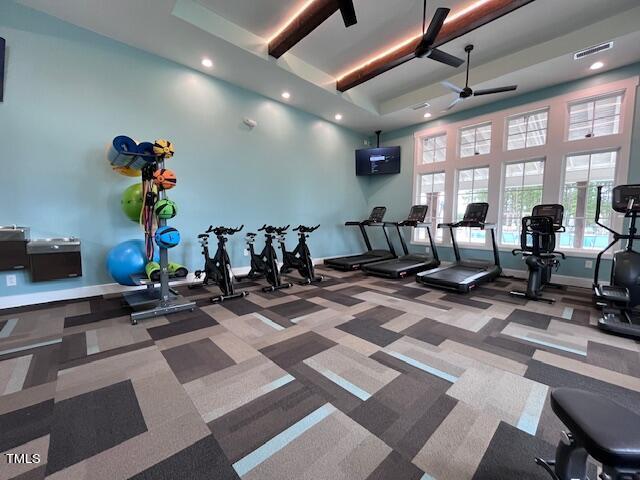 workout area featuring visible vents, baseboards, ceiling fan, and recessed lighting