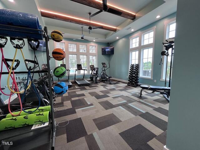 workout area with recessed lighting, carpet flooring, and baseboards