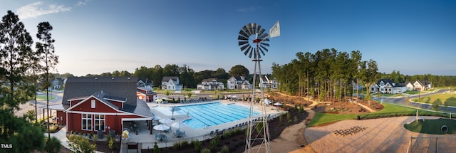 view of swimming pool with a patio