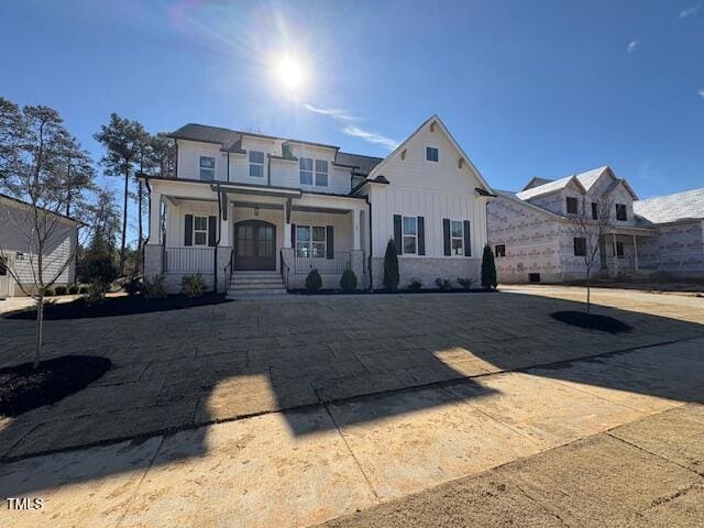 view of front of house featuring covered porch