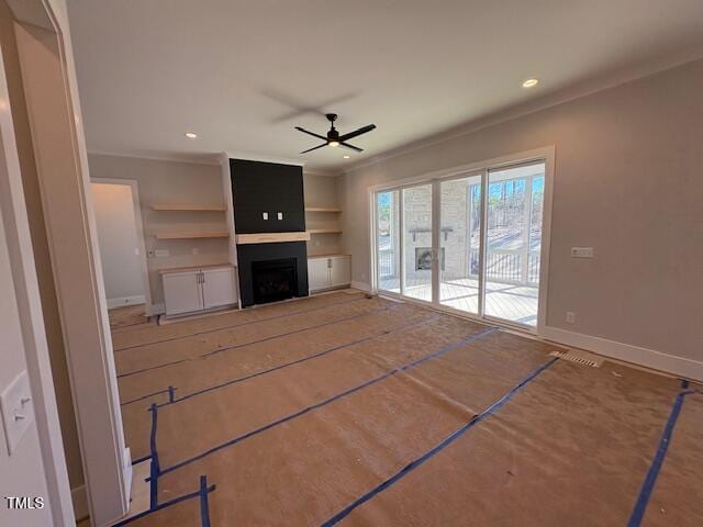 unfurnished living room with crown molding and ceiling fan