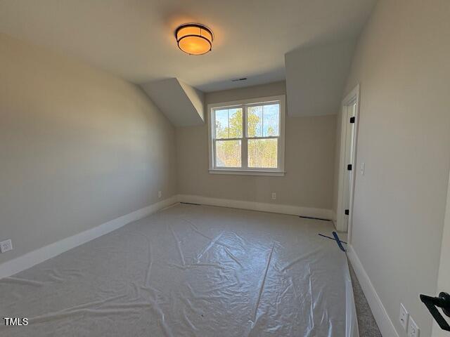 bonus room with lofted ceiling