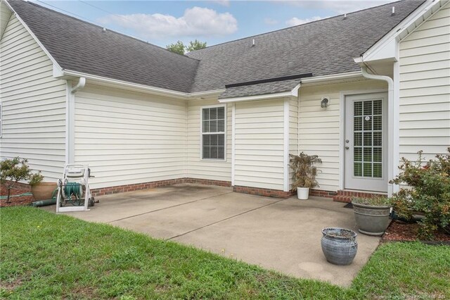 back of house featuring a patio