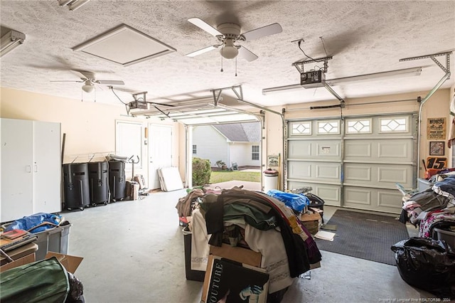 garage with a ceiling fan and a garage door opener