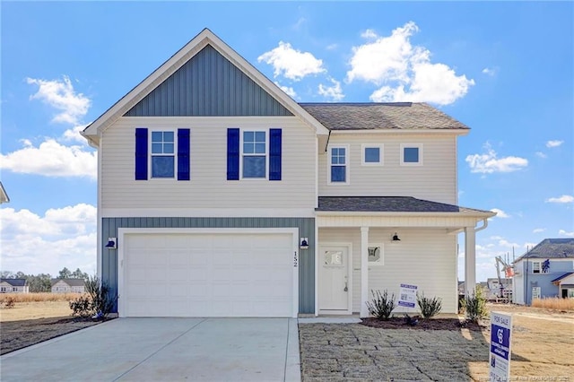 front of property with a garage