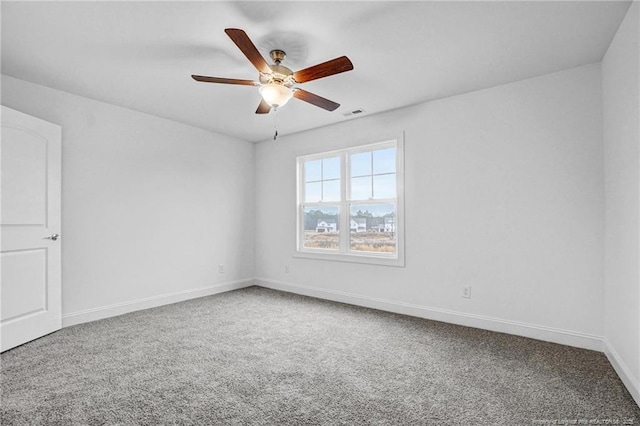 carpeted empty room with ceiling fan