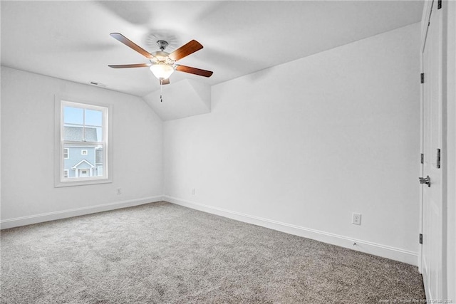 bonus room featuring vaulted ceiling, carpet flooring, and ceiling fan