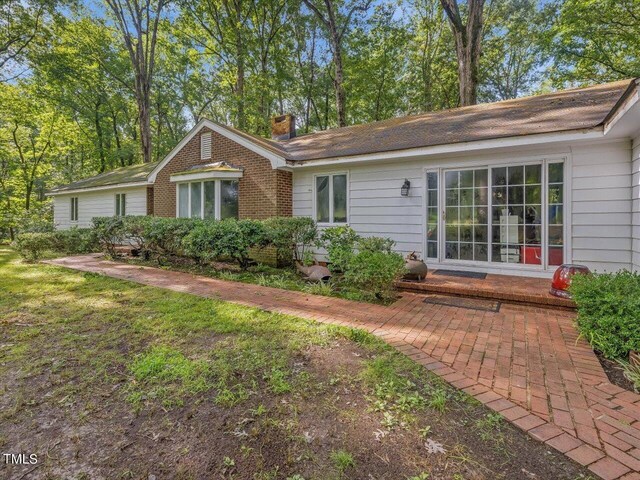 view of front of home with a patio